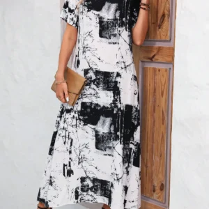 Robe longue pour femme à imprimé abstrait noir et blanc - Robe décontractée à col rond et manches courtes, coupe ample, idéale pour les vacances et le bureau